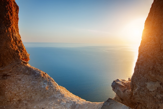 Sunset view from mountaintop. Tourism, travel, sea background.