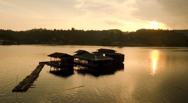 Sunset view and houseboat at Sangklaburi Thailand