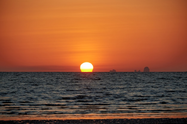 A sunset view with Omega sun at Hat Yao, Krabi, Thailand