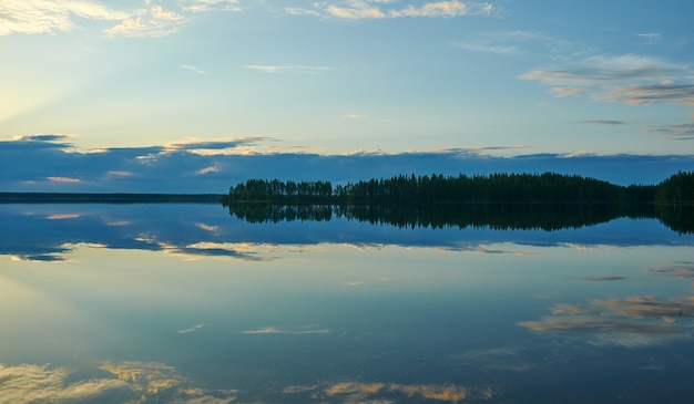 Sunset over wild Lake Haikola. Travel to Russia. Republic of Karelia