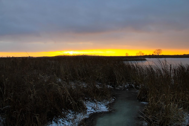 Sunset over the winter river