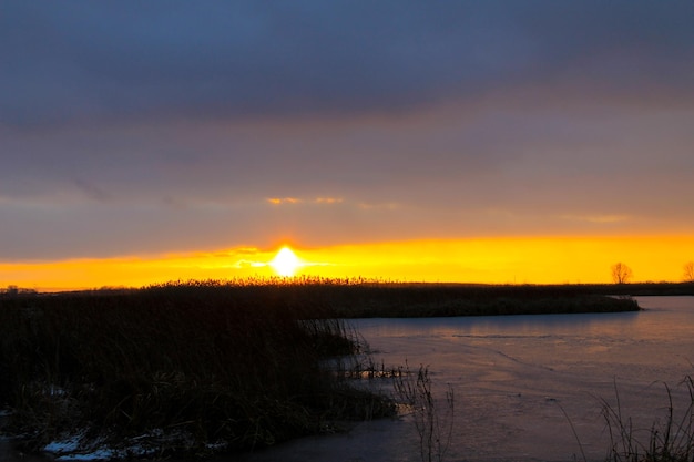 Sunset over the winter river