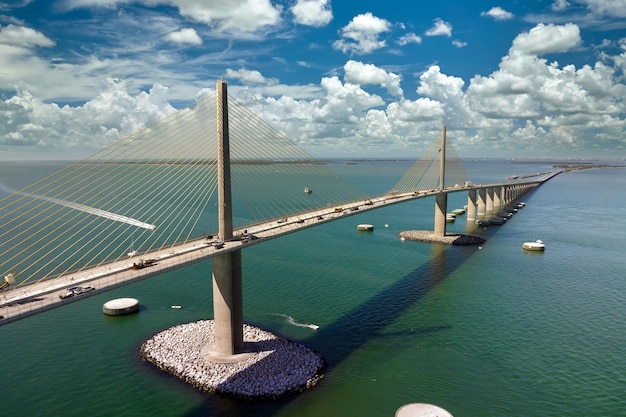 Sunshine Skyway Bridge over Tampa Bay in Florida with moving traffic Concept of transportation infrastructure