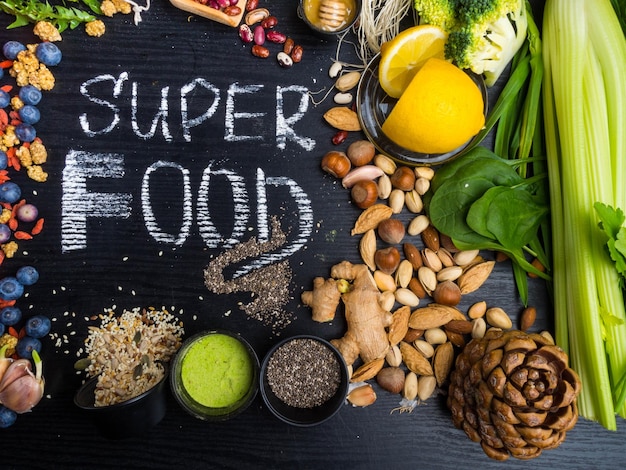 Super foods on a black wooden background