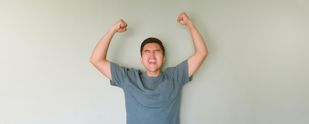 Super happy man celebrating a victory