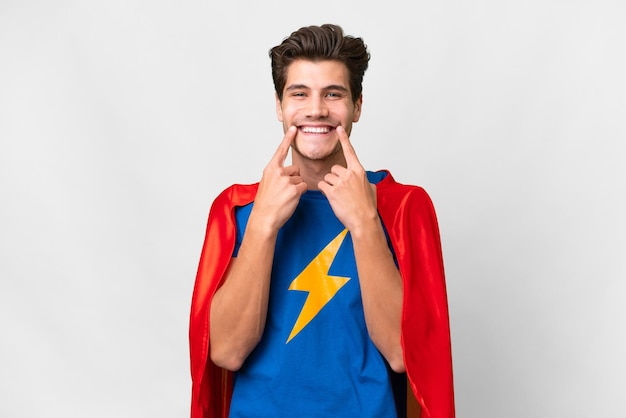 Super Hero caucasian man over isolated white background smiling with a happy and pleasant expression