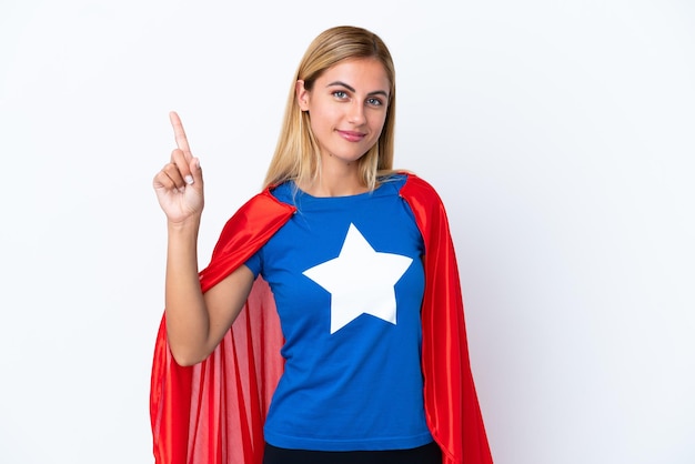 Super Hero caucasian woman isolated background showing and lifting a finger in sign of the best