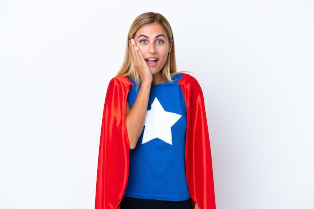 Super Hero caucasian woman isolated background with surprise and shocked facial expression