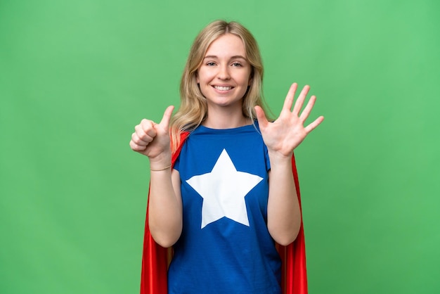 Super Hero English woman over isolated background counting six with fingers