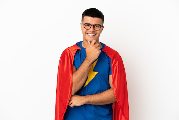 Super Hero over isolated white background with glasses and smiling