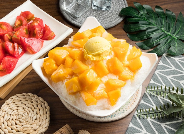 Super Mango Ice cream served in bowl isolated on table side view of taiwan food