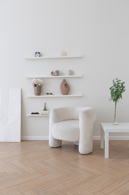 Super white simple clean and stylish interior with modern furniture in nude color and contrasting black elements luxury design of a large bright room living room