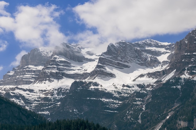 Superbly visible mountainous rock layers of alpine peaks covered with snow. Ville d'Anaunia, Italy