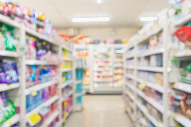 Supermarket aisle interior shelves blur background