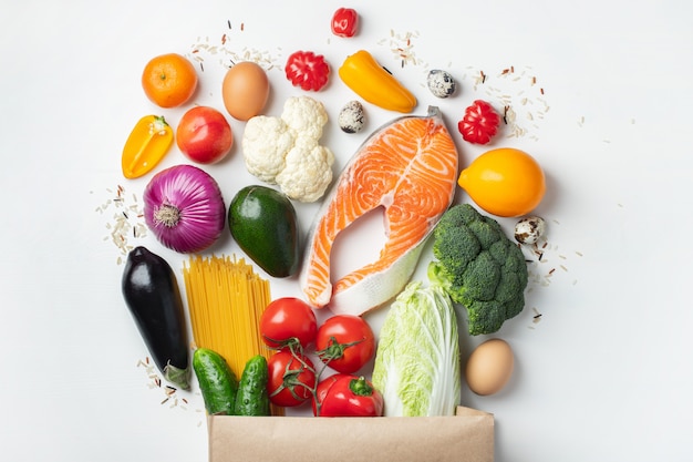 Supermarket. Paper bag full of healthy food.