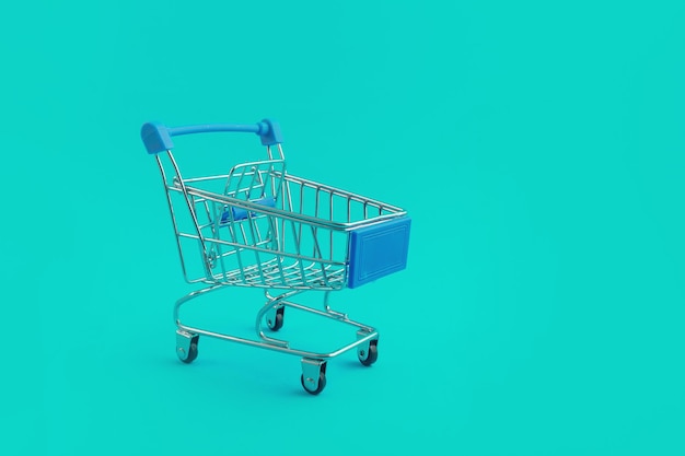 Supermarket trolley on blue background