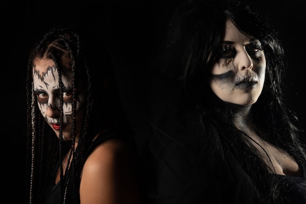 Supernatural entities, portrait of two supernatural entities, artistic makeup, black background, Low Key portrait, selective focus.