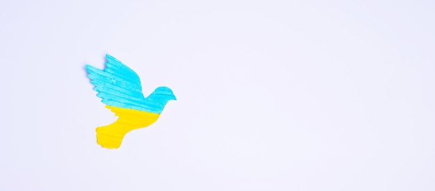 Support for Ukraine in the war with Russia peace dove with flag of Ukraine Pray No war stop war and stand with Ukraine concepts