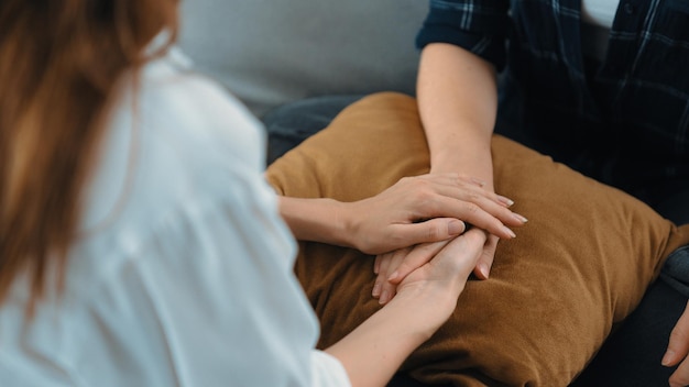 Photo supportive and comforting hands for prim empathy in therapy office