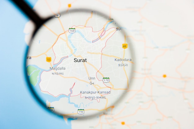 Surat city visualization illustrative concept on display screen through magnifying glass