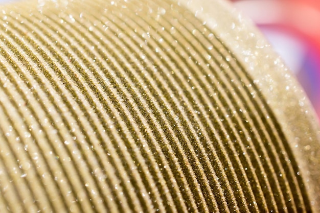 Surface of abrasive stone for tool sharpening Shallow depth of field Abstract industrial background