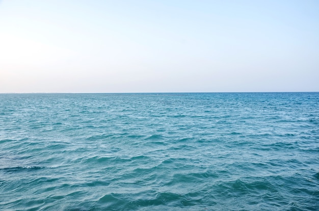 Surface of blue sea water and sky horizon