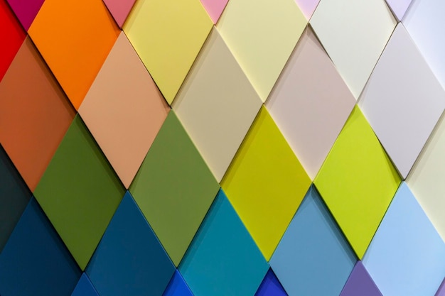 Surface of multi-colored rhombuses. Construction, renovation and interior design. Background.