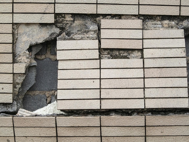 The surface of the wall is cracked by a disaster, earthquake, car crash, or incorrect construction.