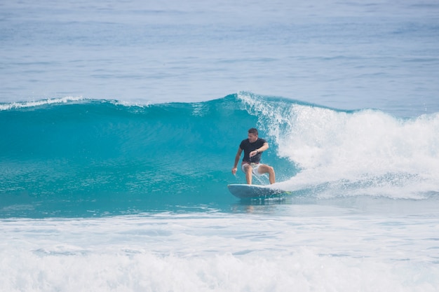 Surfer rides a wave. A short surfboard. Atlantic Ocean.