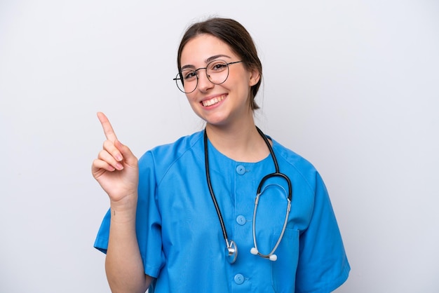 Surgeon doctor woman holding tools isolated on white background showing and lifting a finger in sign of the best