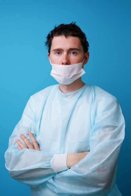 Surgeon in sterile blue uniform