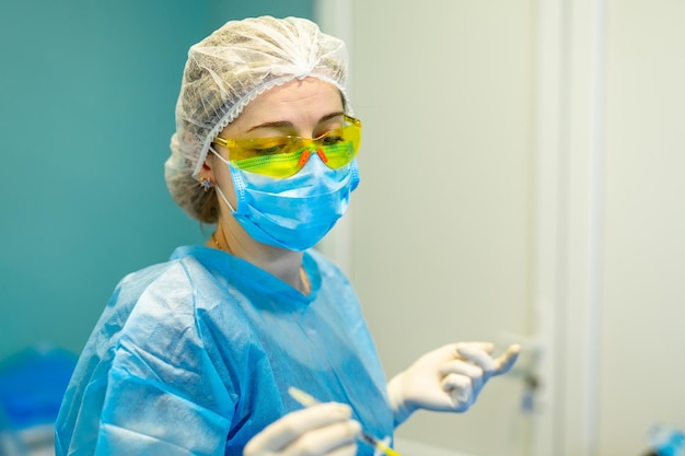 Surgery professional processGroup of surgery specialists in operating room