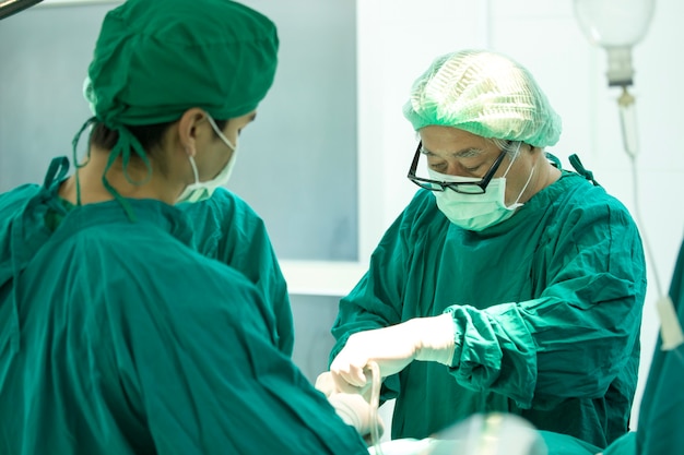 The surgery team working together at the operating room in the hospital