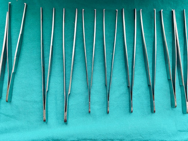 Surgical forcep on tableused for wound dressing in hospital must be cleaned and disinfected