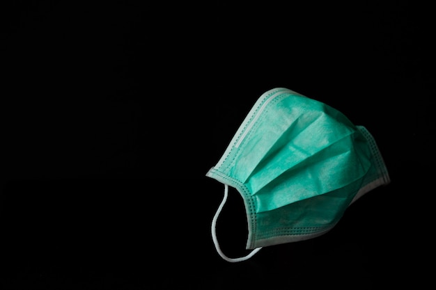 Surgical mask  isolated on black