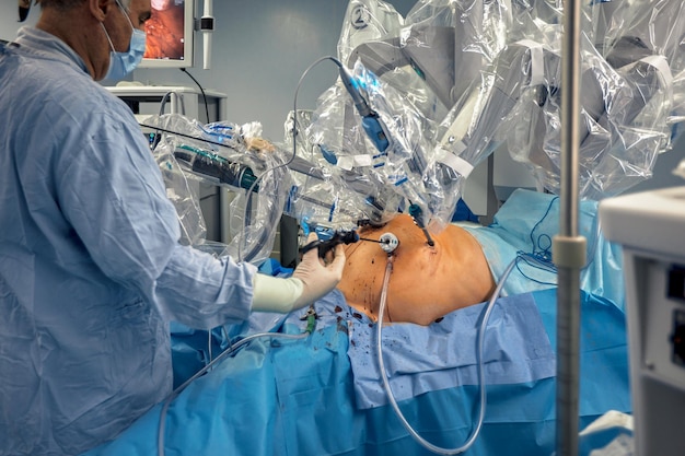 Photo surgical system with minimally invasive robot in a hospital robotic technological equipment