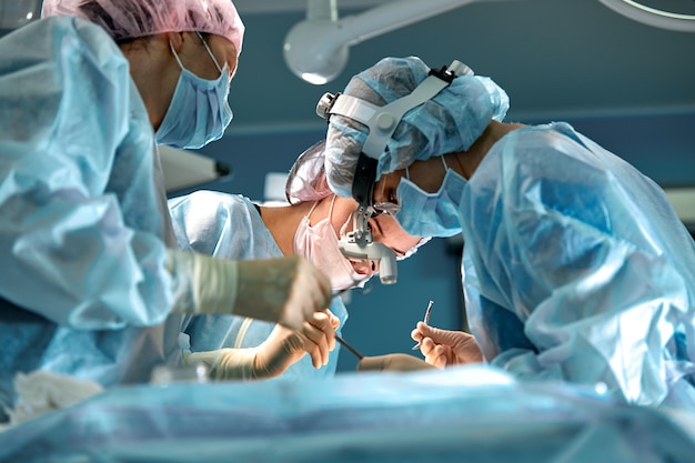 Surgical team in the operating room, close-up.