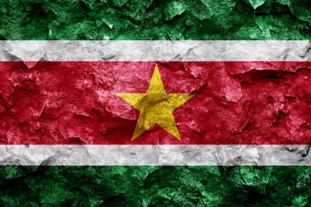 Photo suriname flag on a grunge background