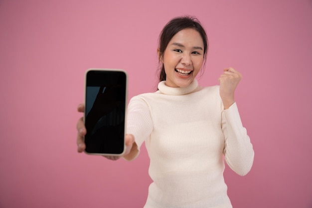 Surprise face wow face woman excited about success on smartphone Screen display on mobile phone show results of successful rewards bonuses get promotions winner wining discount shopping