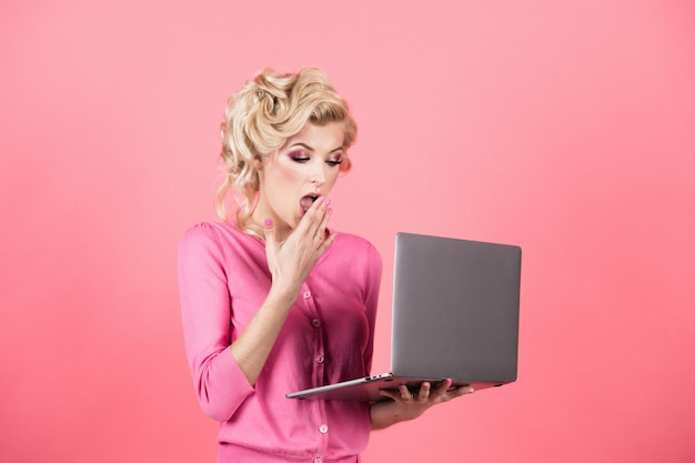 Surprised business woman face young business woman isolated on studio background woman with laptop p