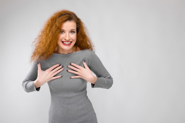 Surprised woman in fashionable clothes