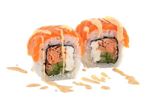 Sushi closeup isolated on white background Sushi roll with red fish trout