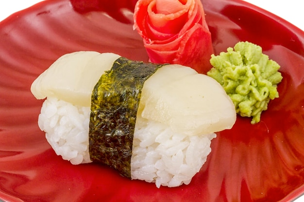 Sushi hotate with slice of scallop isolated on white background