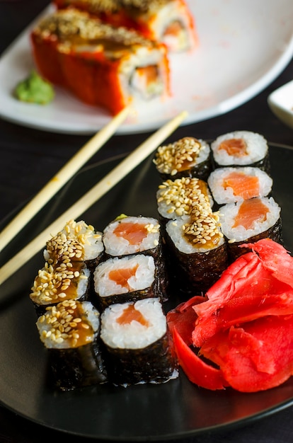 Sushi mackerel with salmon and eel on a platter