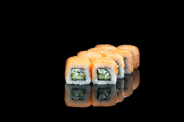 Sushi Roll On A Black wall reflection . Japanese food. Close Up.