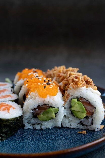 Sushi roll sushi with shrimp avocado red caviar sesame Sushi menu Japanese food