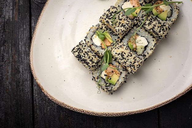 sushi roll with wasabi  on the plate. delicious food, close-up