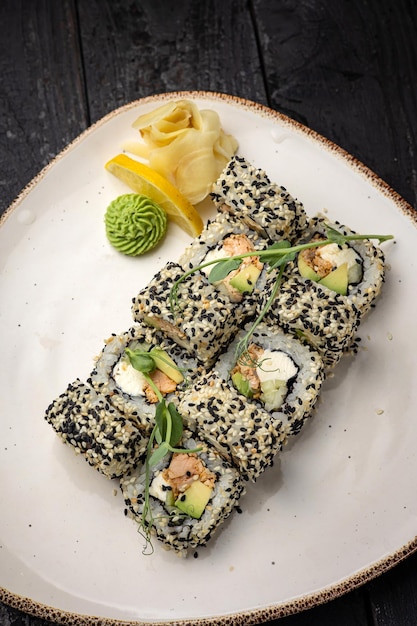 sushi roll with wasabi  on the plate. delicious food, close-up