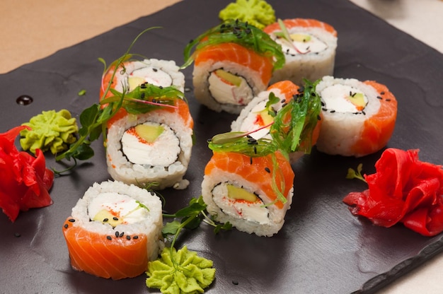 Sushi rolls with salmon crab avocado and cream cheese