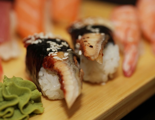 Sushi served on wooden board